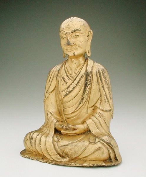 Figure of a seated lohan by Liao Dynasty Chinese School