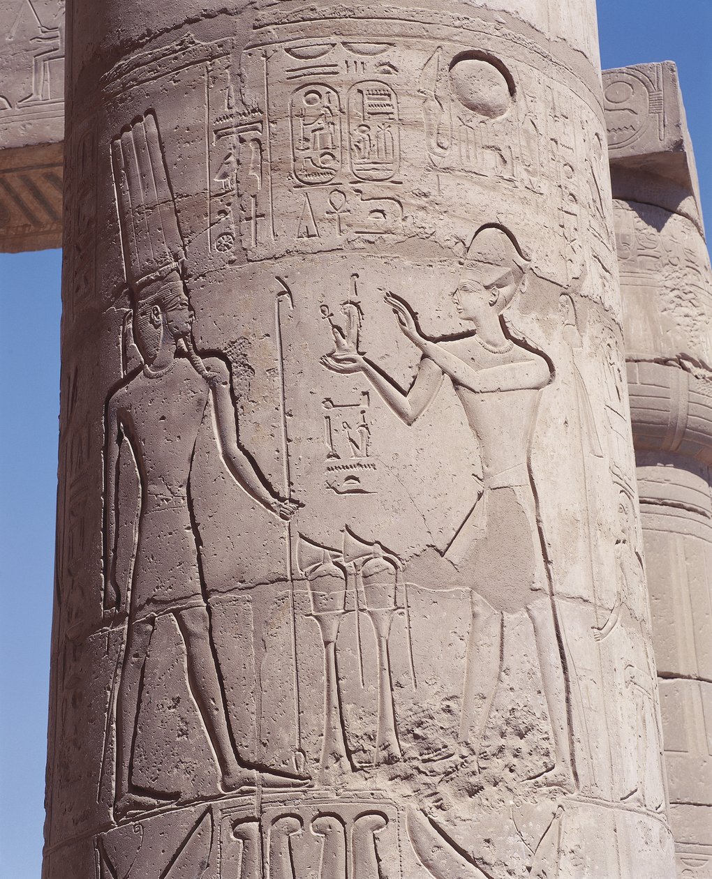 Relief of pharaoh holding goddess of justice Maat before Amon on pillar by Unbekannt Unbekannt