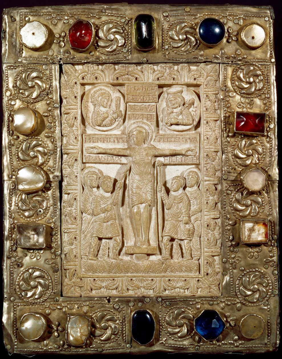 Archaeology of the Middle Ages. Barbarian art of Lombardy: the peace of Duke Orso. The ivory part represents Christ crucified surrounded by the Virgin, Saint Longinus the Centurion and Saint John. Lombard art of the 9th century. by Lombard School
