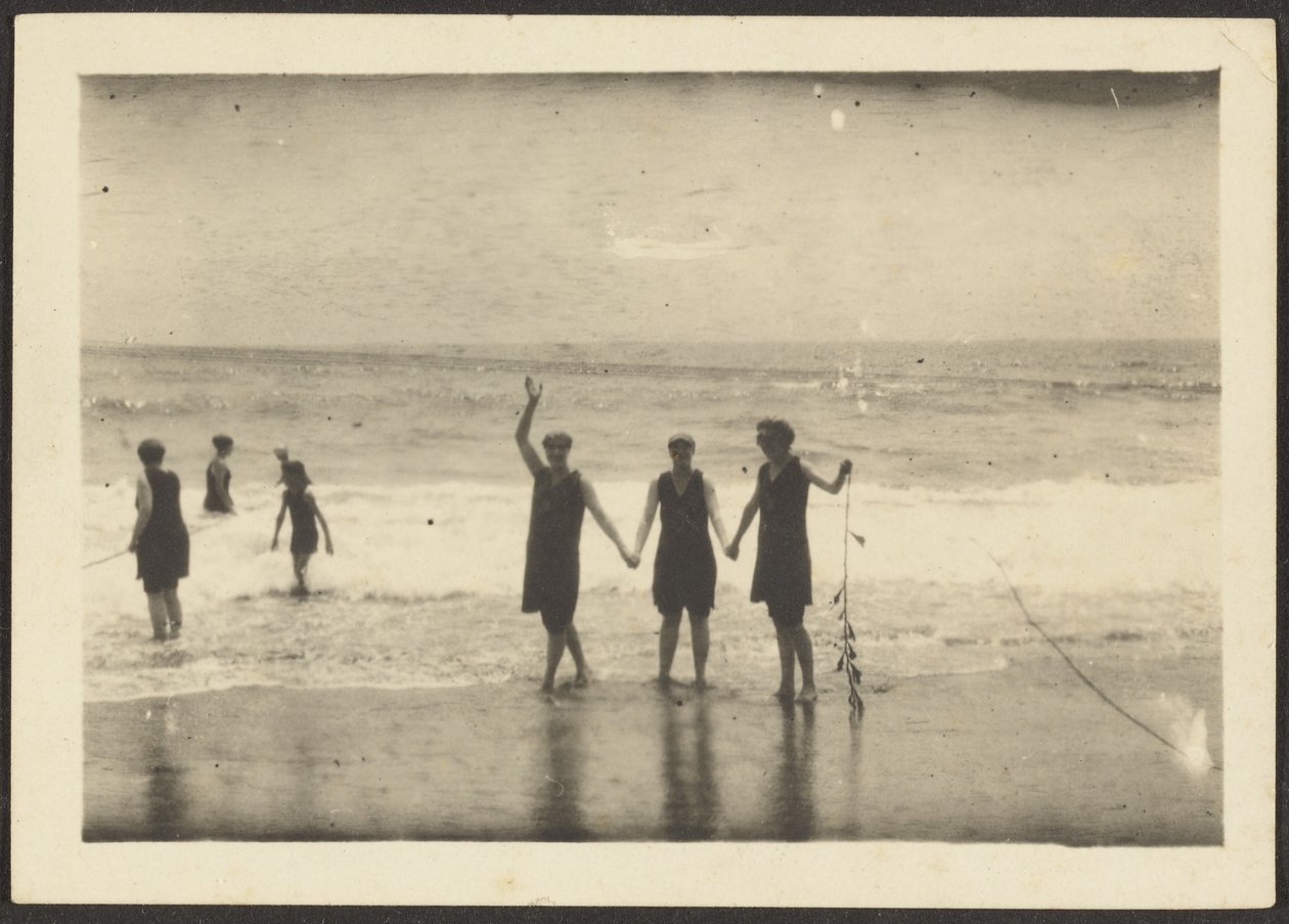 Figures on a Beach Holding Seaweed by Louis Fleckenstein