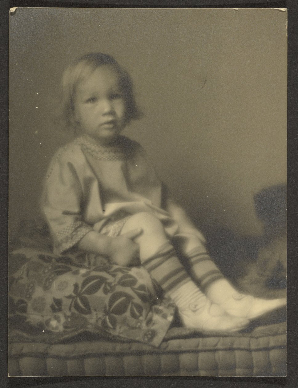 Little Girl on Cushion by Louis Fleckenstein