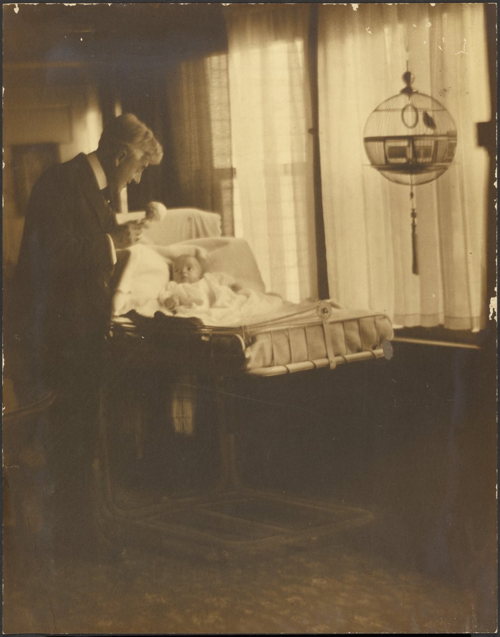 Man and Infant with Birdcage by Louis Fleckenstein