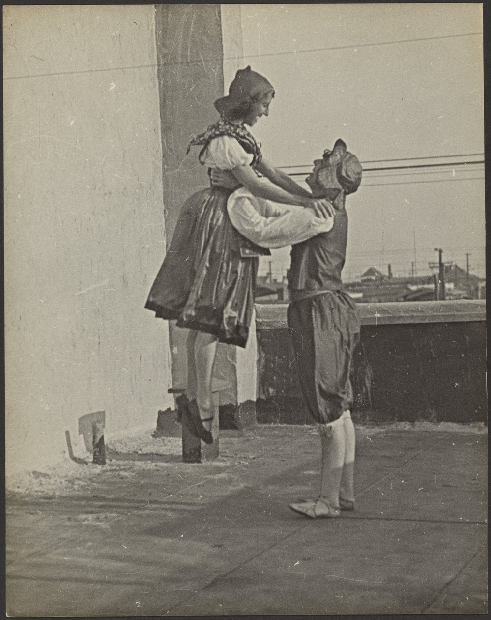 Man and Woman Dancing in Costume by Louis Fleckenstein
