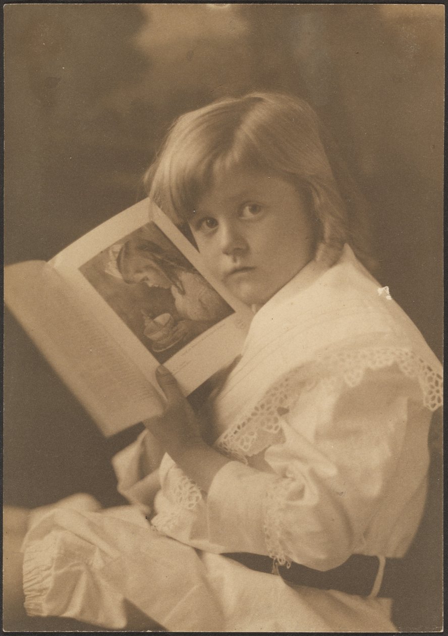 Portrait of Child Holding Book Open to Illustration by Louis Fleckenstein