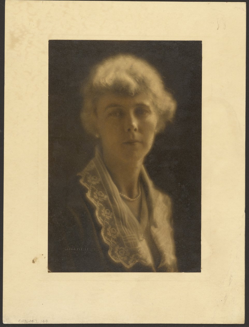 Portrait of a Woman with Lace Collar and Pearls by Louis Fleckenstein