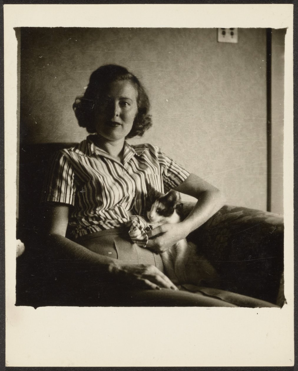 Woman in Chair with Cat by Louis Fleckenstein