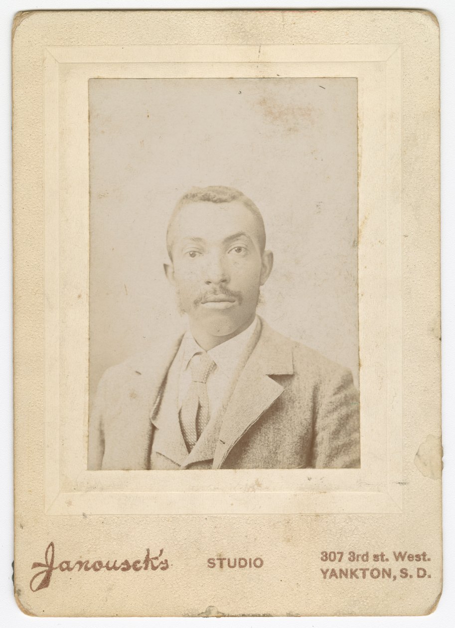 Photograph of a man wearing a light colored jacket, vest and necktie, late 19th century by Louis Janousek