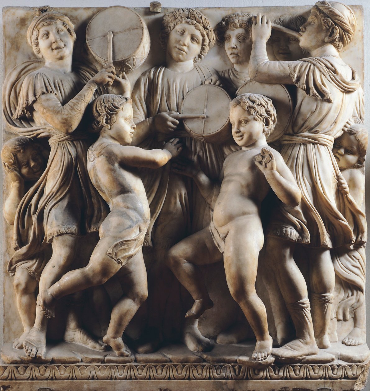 Children and cherubs dancing, singing and playing (detail) by Luca Della Robbia