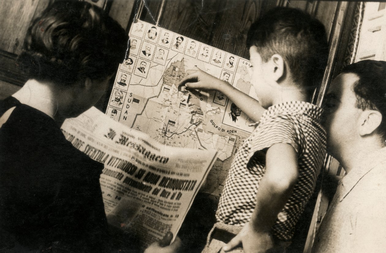 A Woman Reads the Front Page of The Messenger with the Title 
