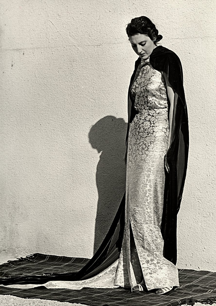 Model in evening dress created by the Italian couture house "Dragoni" by Luis Bogino