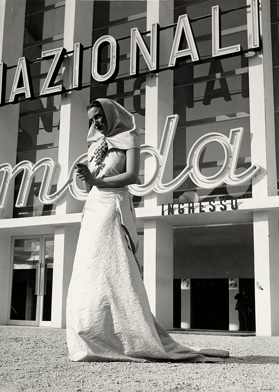 Model in wedding gown created by the couture house 