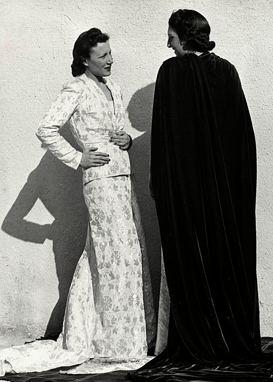Two models present creations of the Italian couture house 