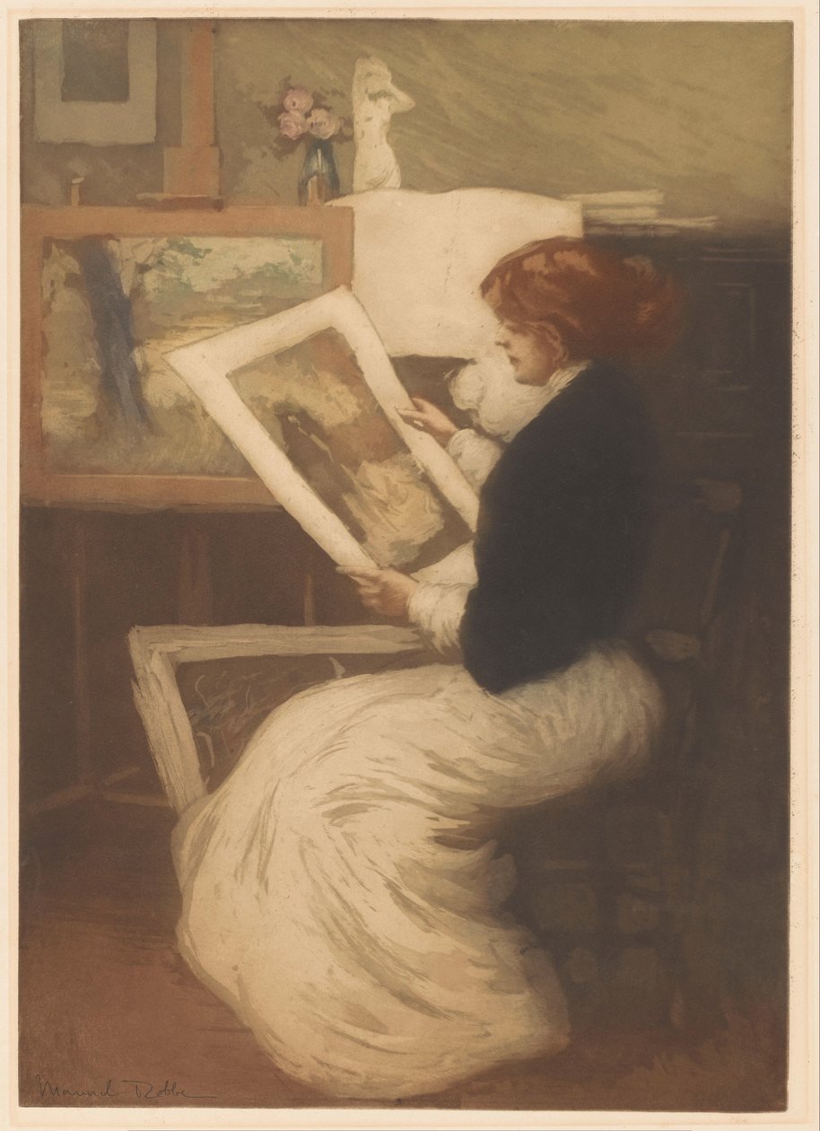 Woman Looking at a Print by Manuel Robbe