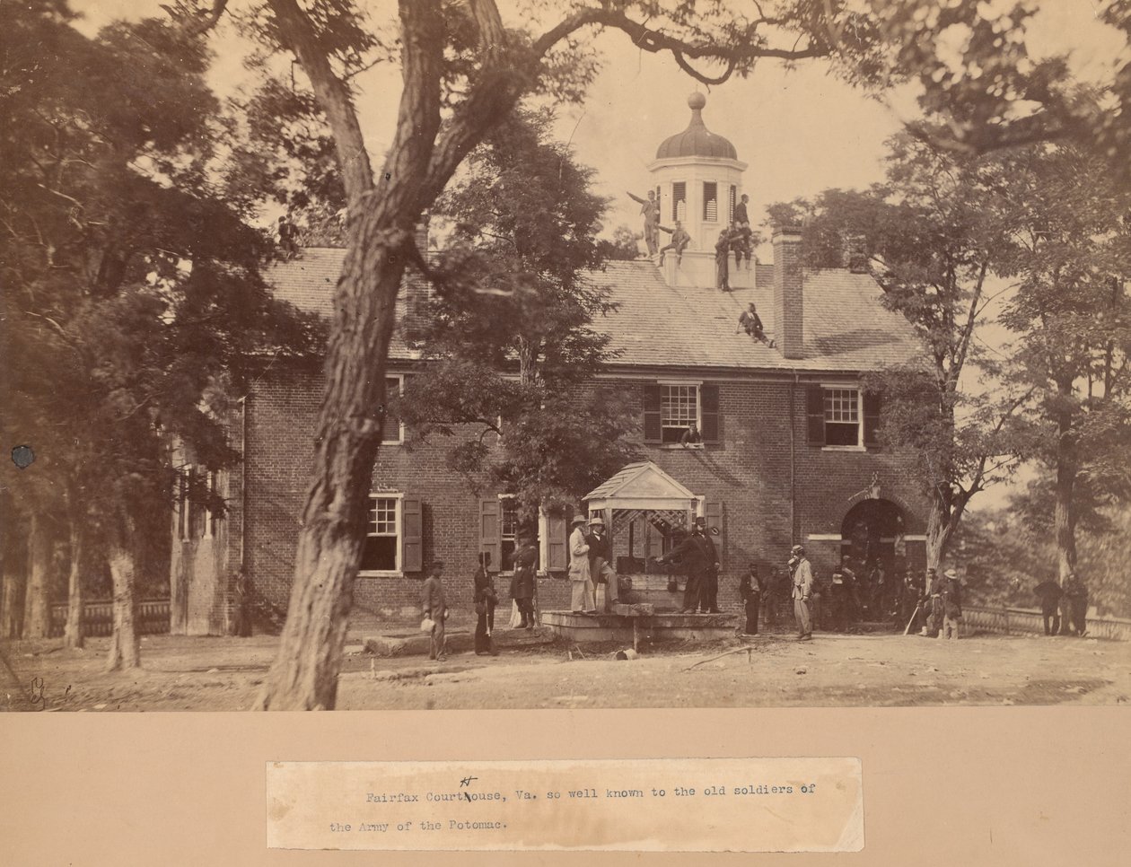 Fairfax Court House, Virginia, with Union Soldiers in Front and on the Roof by Mathew Brady