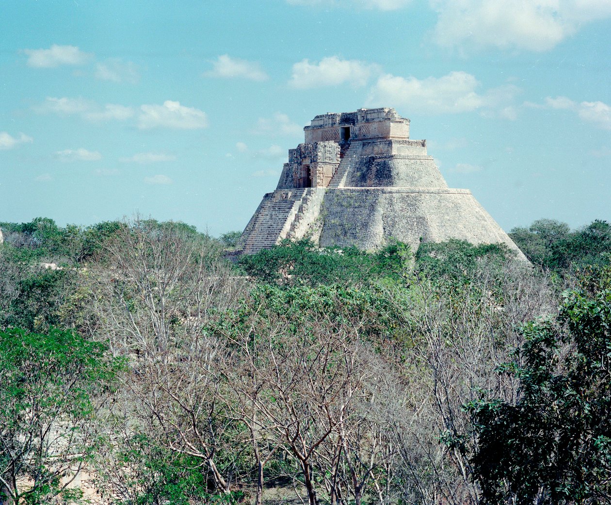 Precolombian civilization: view of the upper temple on the site of Uxmal ancient Maya capital, Puuc style. North Yucatan 600-900 AD. Mexico by Mayan