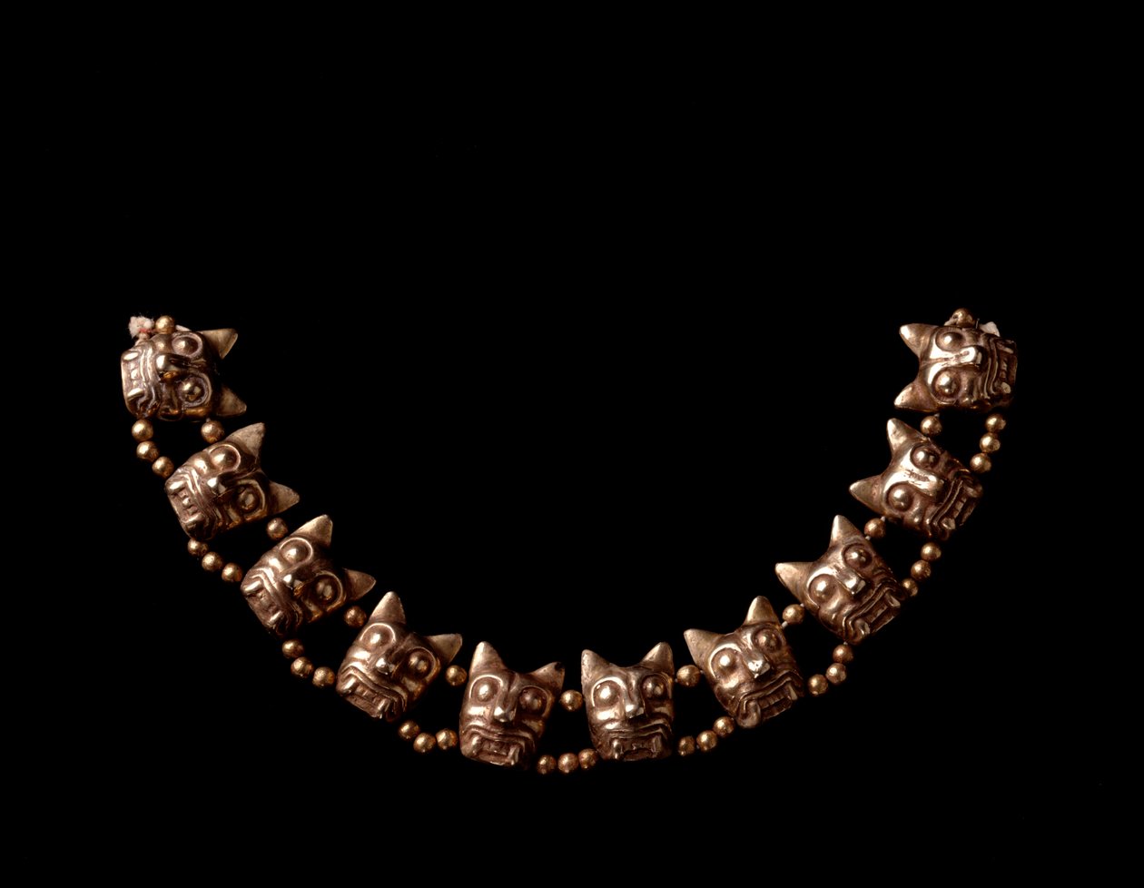 Pre-Columbian Art, Maya Civilization, Postclassical Period: Gold Necklace Composed of Elements in the Shape of Jaguar Heads. 600-1100 AD from Iximche, Chimaltenango, Guatemala by Mayan Mayan