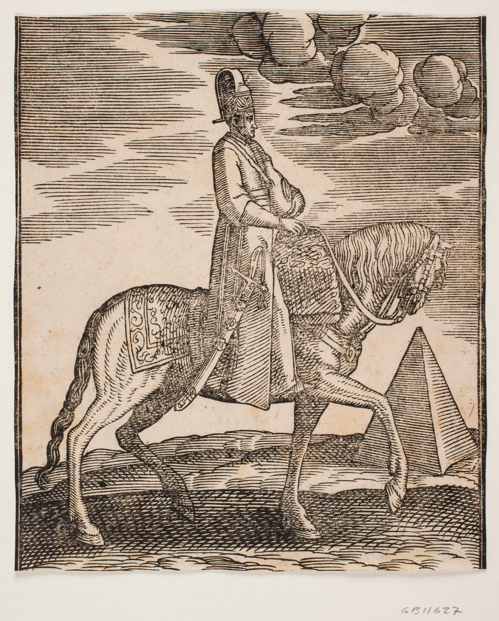 Rider with a Flask Around His Neck, Profile Towards the Right; a Sword at His Right Side and Baggage in Front of Him, Draped Across the Saddle; to the Right, in the Background, a Pyramid by Melchior Lorck