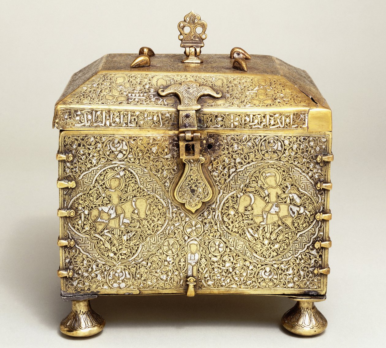 A Mesopotamian silver inlaid brass casket, with dials for a combination lock by Mesopotamian