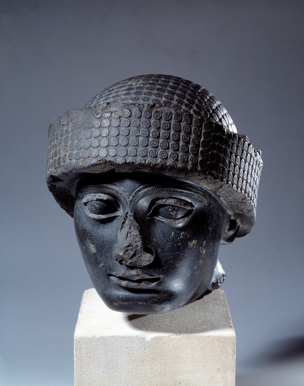 Head in Diorite Without Inscription of Gudea, Governor of the City of Lagash. About 2120 BC. Neo-Sumerian Period (ca. 2150-2000 BC). Paris, Louvre Museum by Mesopotamian Mesopotamian