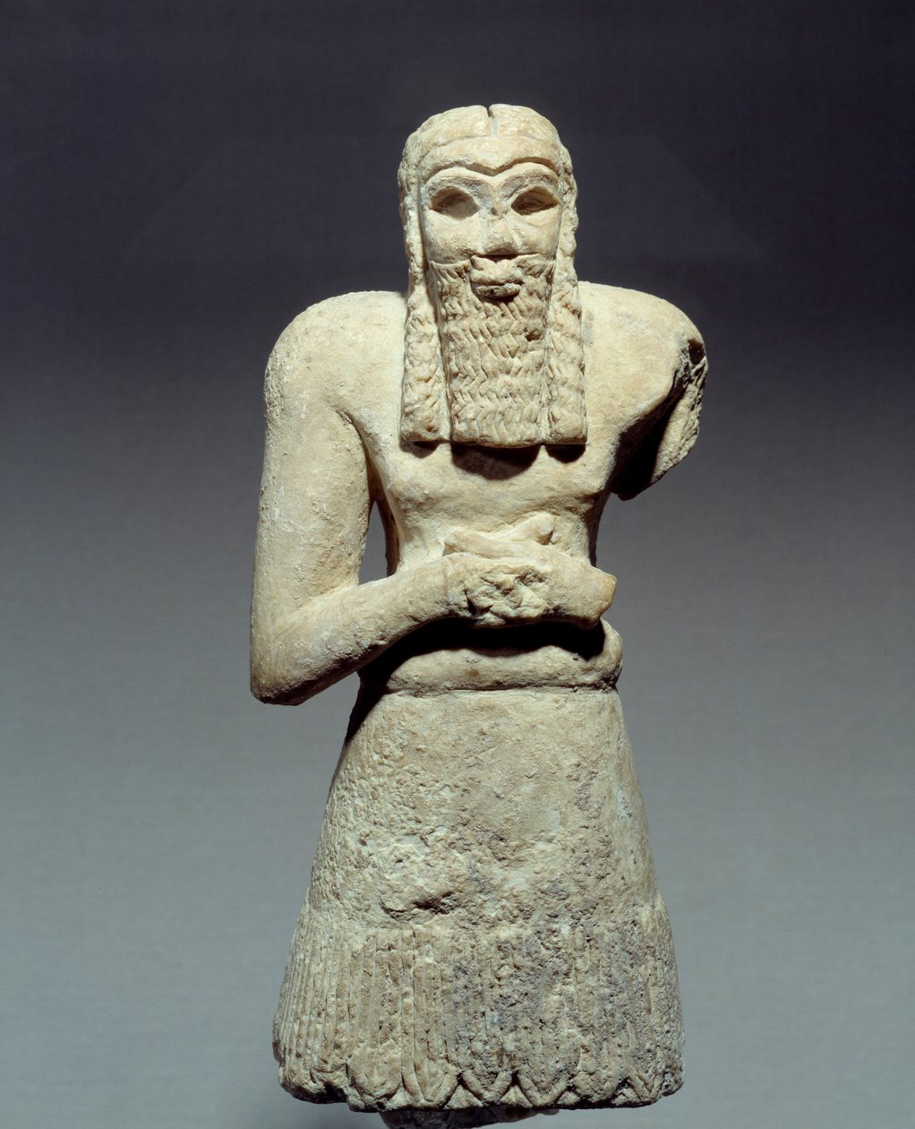 Statuette in Limestone of Orant Vowed to Prince Ginak by Mesopotamian Mesopotamian