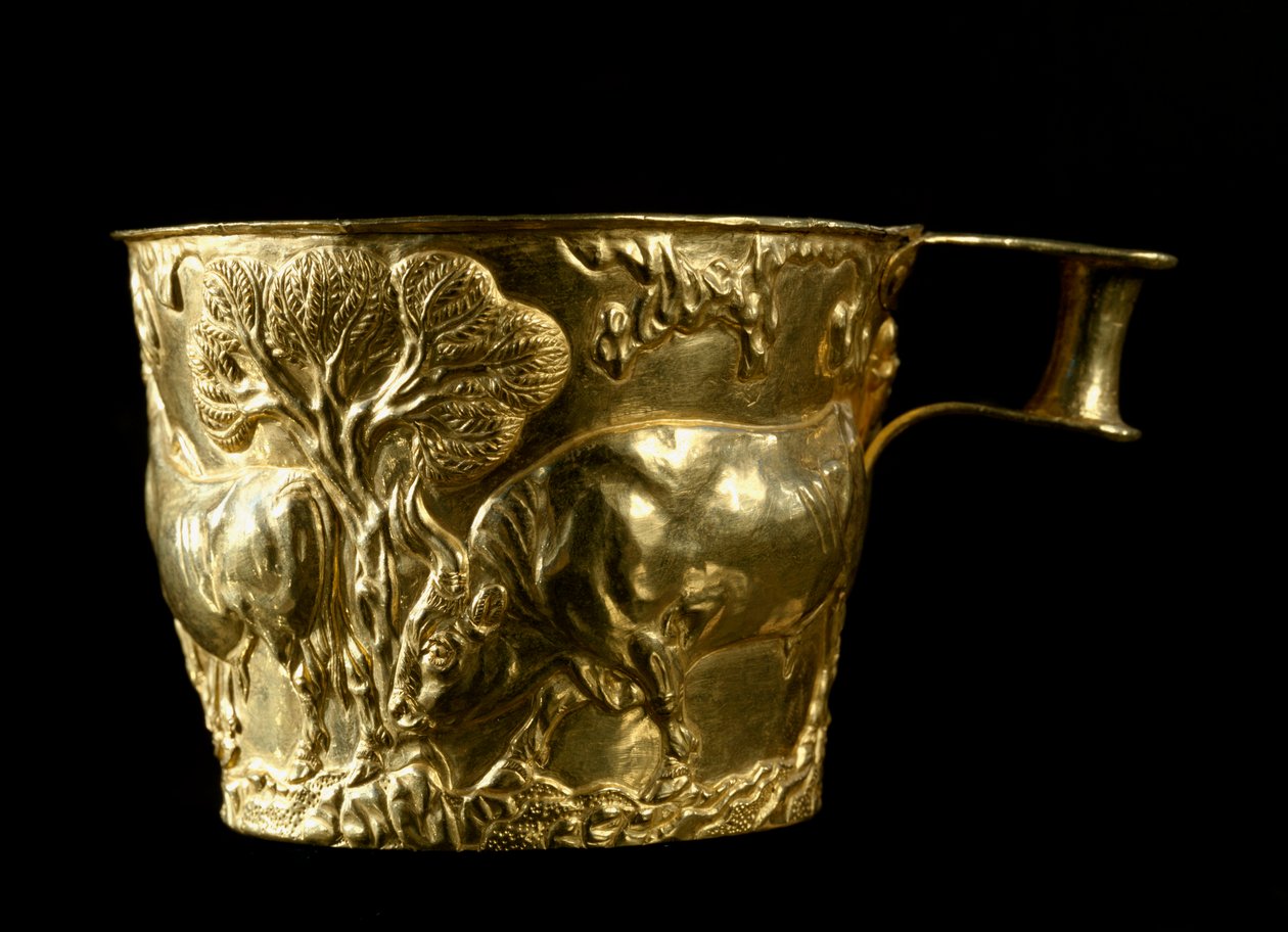 Mycenaean art: gold cup with representation of a bull sniffing the terrain from the site of Vapheio by Mycenaean