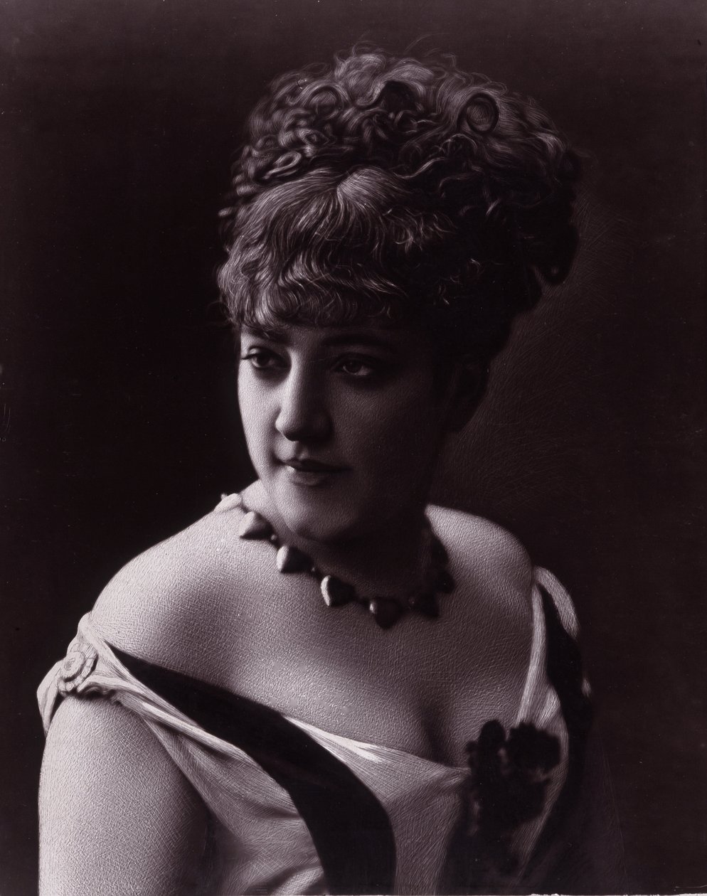 Portrait of a Woman Wearing a Necklace with Heart-Shaped Pendants by studio of Nadar