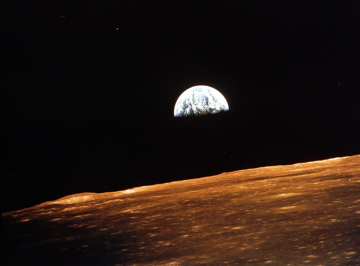 View of Earth from Apollo 10 from approximately 100,000 miles. Europe, Asia and parts of Africa visible with some cloud cover by National Aeronautics and Space Administration National Aeronautics and Space Administration