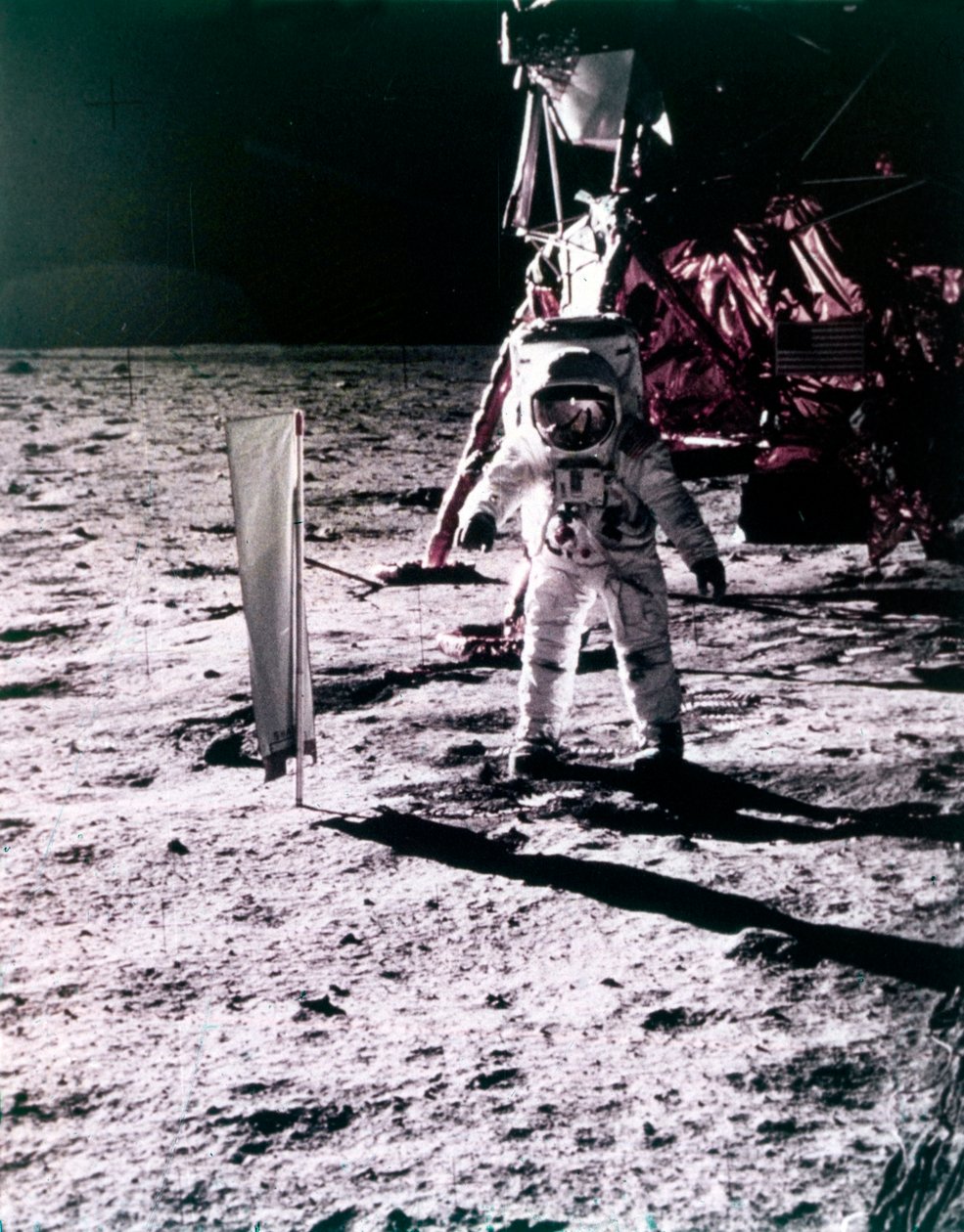 Buzz Aldrin Deploys Solar Wind Collector on the Surface of the Moon, Apollo 11 Mission, July 1969 by Neil Armstrong