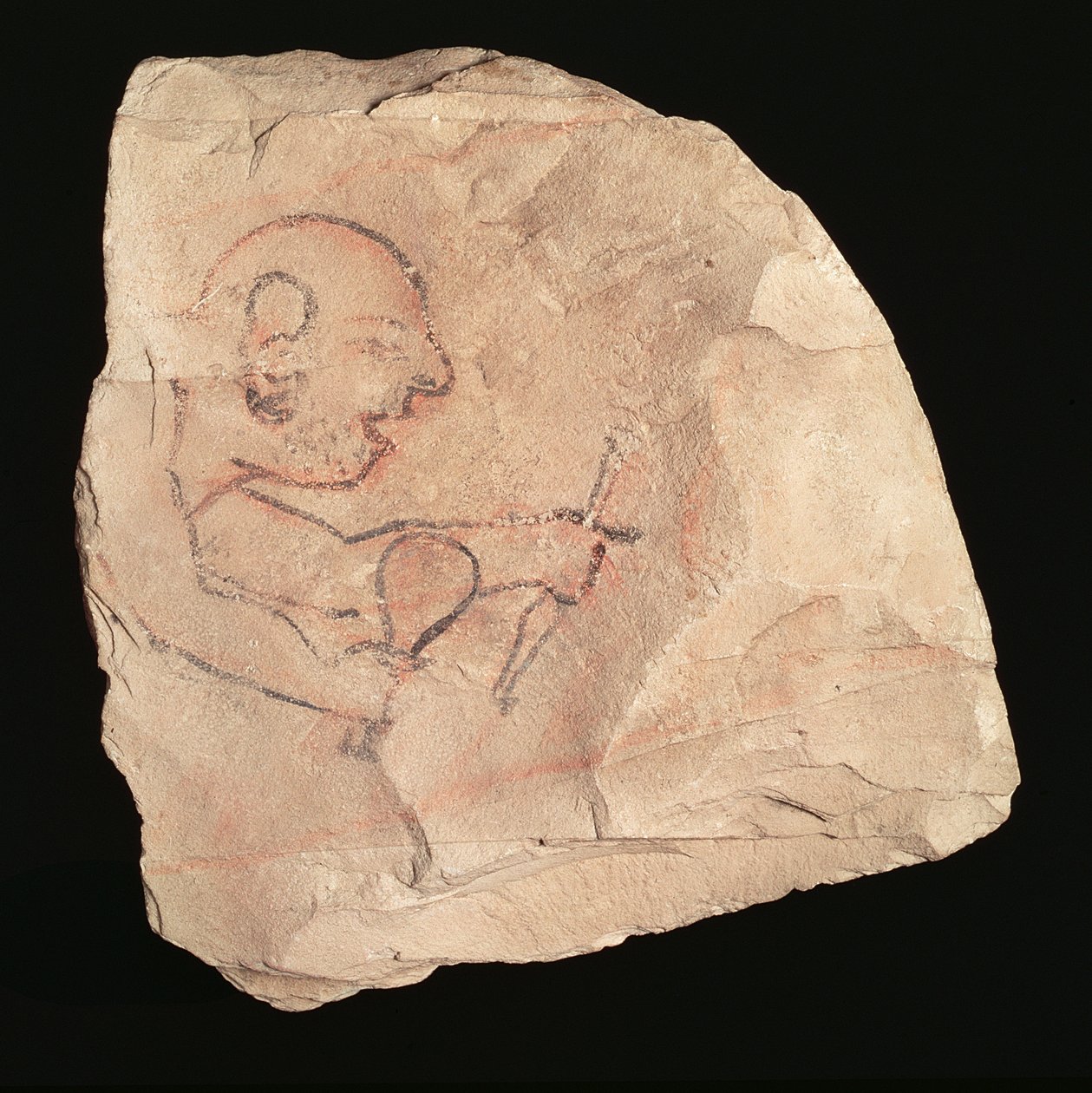 Ostracon depicting an unshaven stonemason by New Kingdom Egyptian