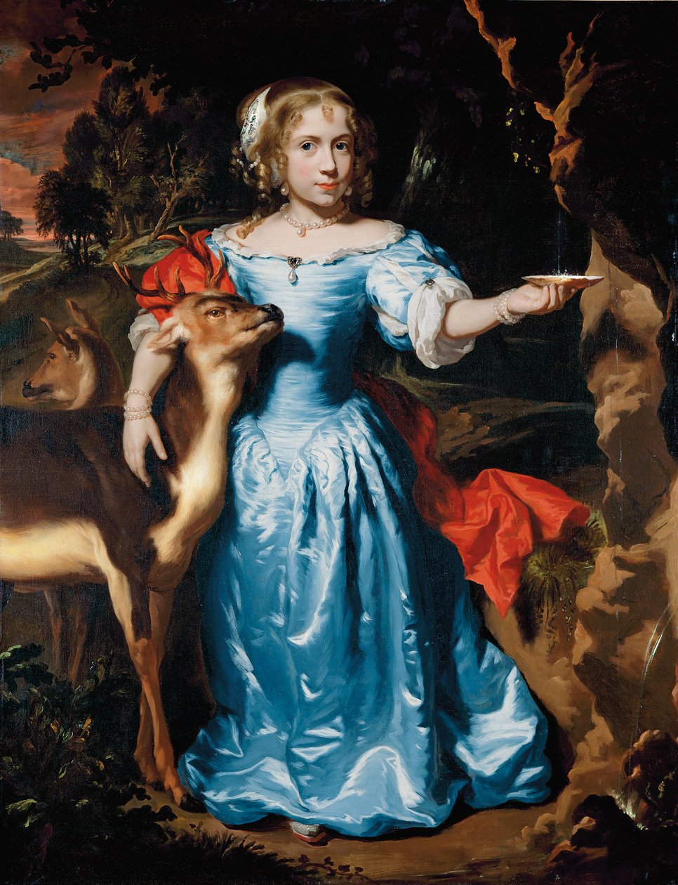 Portrait of a girl, full-length, as Granida, in a blue silk dress and red mantle, her left hand catching water in a shell from a spring, her right hand around a stag by Nicolaes Maes