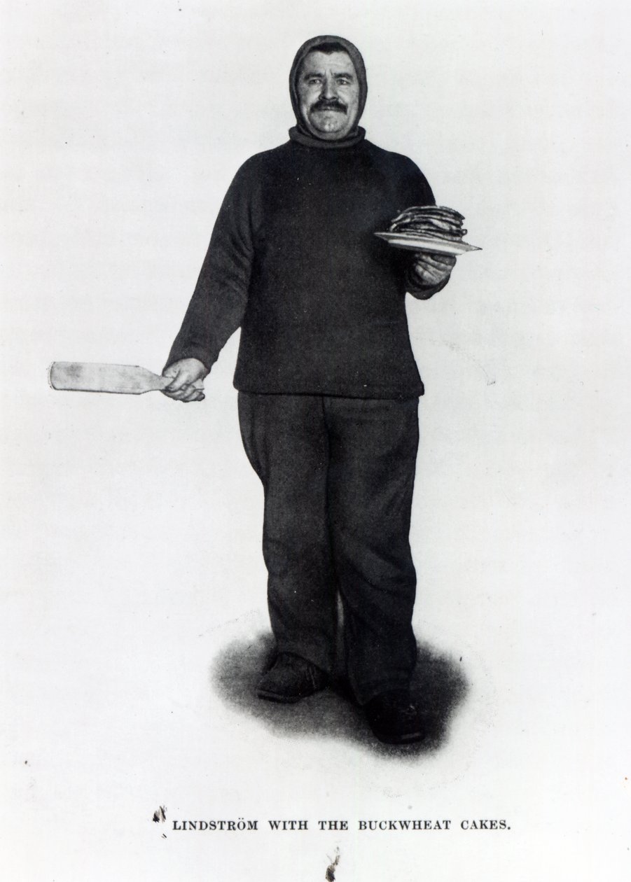 Lindstrom with the Buckwheat Cakes, from The South Pole by Roald E. Amundsen, c.1910-12 by Norwegian Photographer