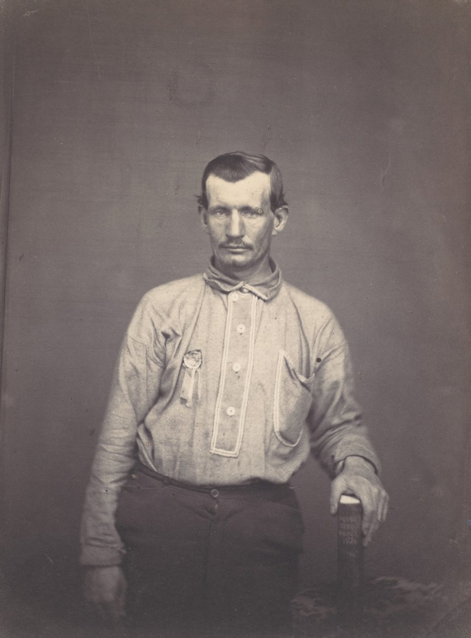 Man Holding Patent Office Book by Oliver H. Willard.