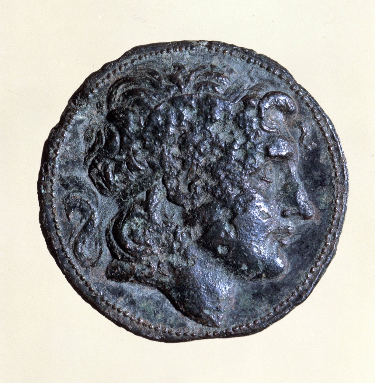 Coin with the effigy of Mithridates I (171 BC - 139 BC), King of the Parthians by Parthian School