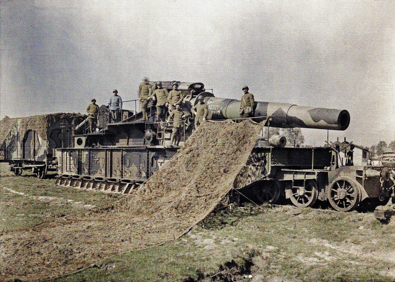Eight French soldiers camouflaging a 370 mm railway gun with the inscription Keity, Noyon, Oise, France, September 5, 1917 by Paul Castelnau