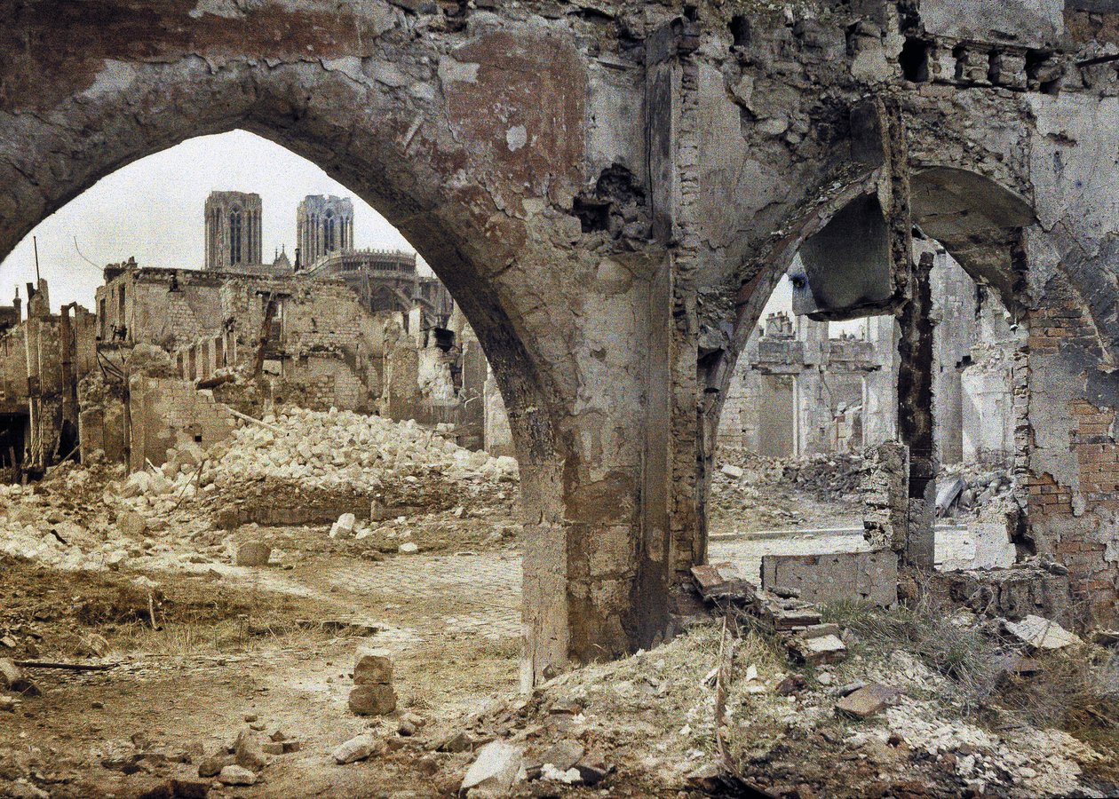 The towers of the Cathedral Notre-Dame de Reims seen through the damaged windows of a downtown building, France, April 3, 1917 by Paul Castelnau