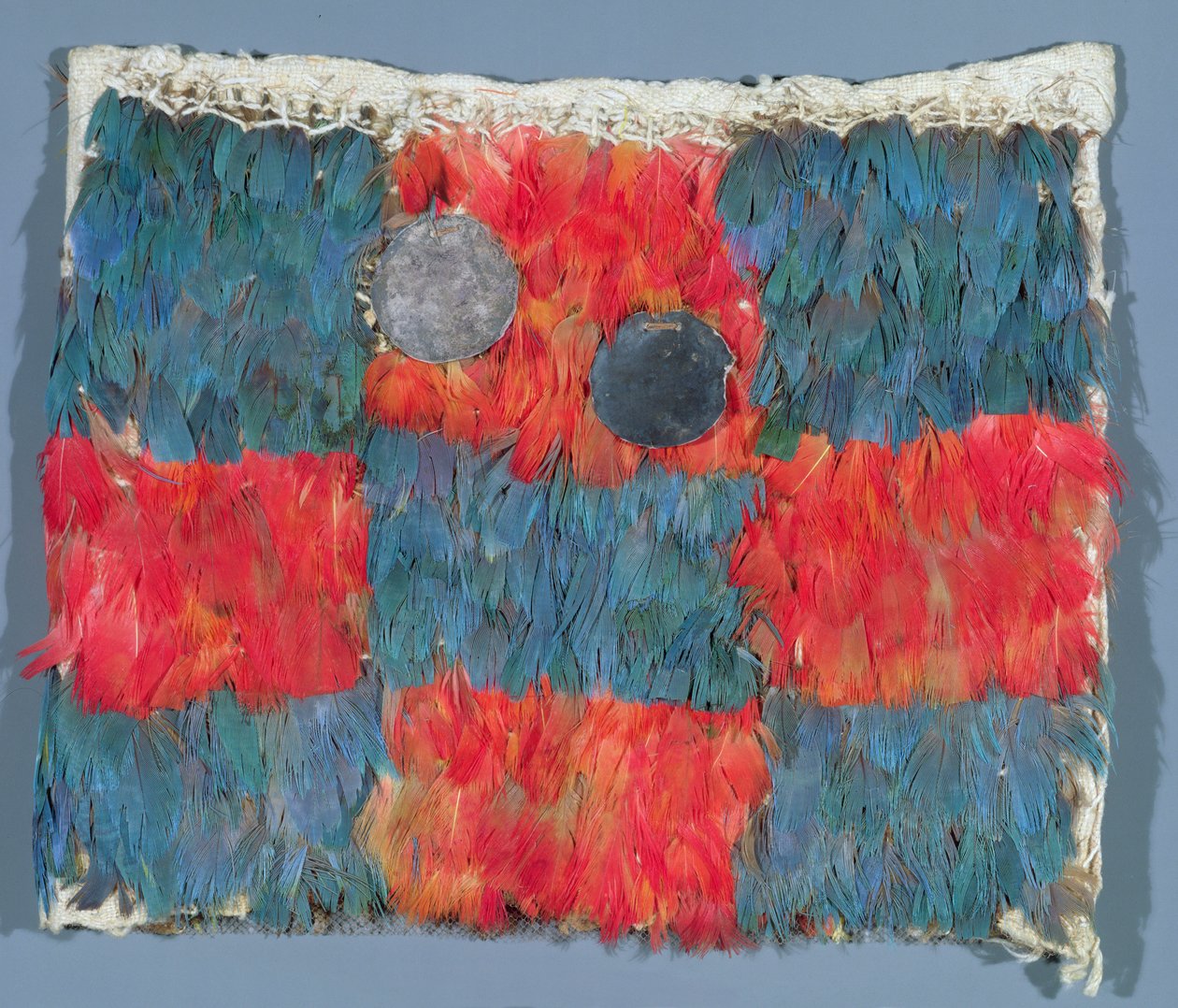 Feathered cape by Peruvian School