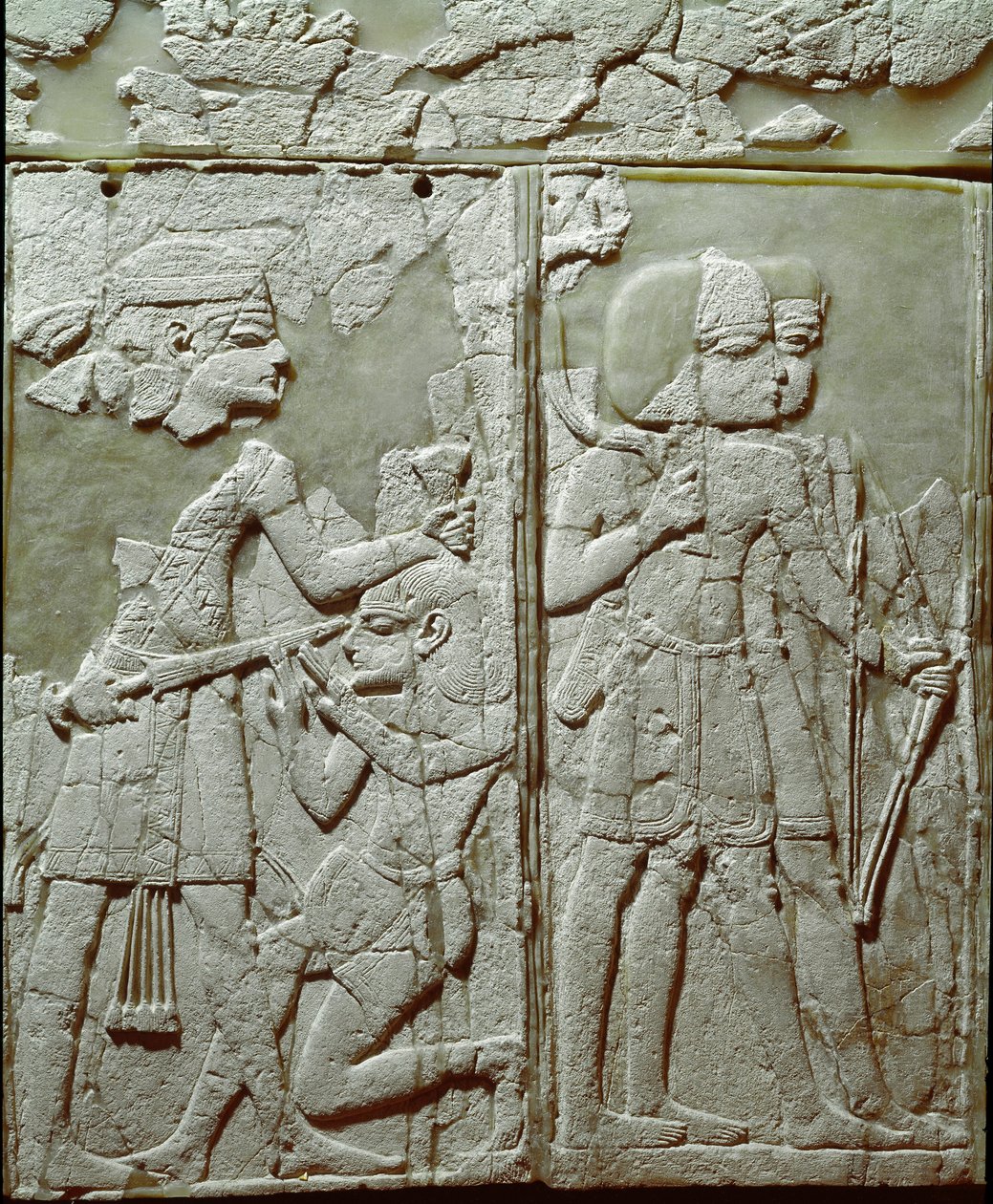 Phoenician Civilization: Bed Ornament with a Low Ivory Relief Representing a King Threatening Enemy by Phoenician