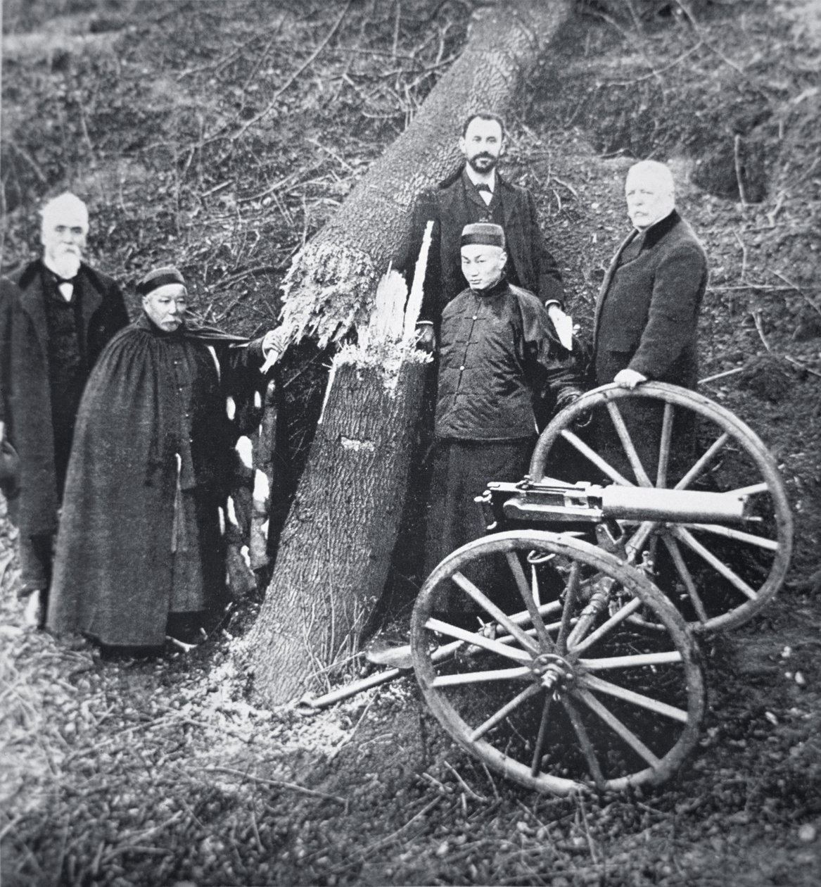 Hiram Maxim demonstrating the power of his gun to Chinese government officials by Photographer English