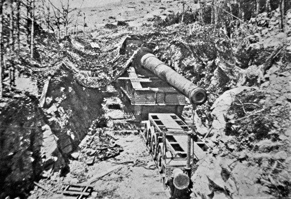 Big Bertha, one of several giant German guns mounted on railtrack during WWI by Photographer German
