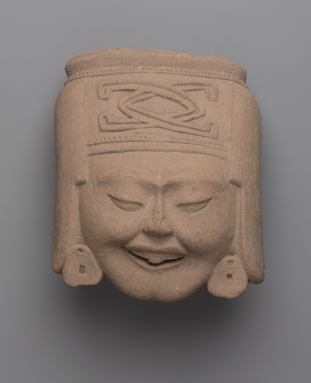 Head of a Laughing Woman, Totonac by Pre Columbian