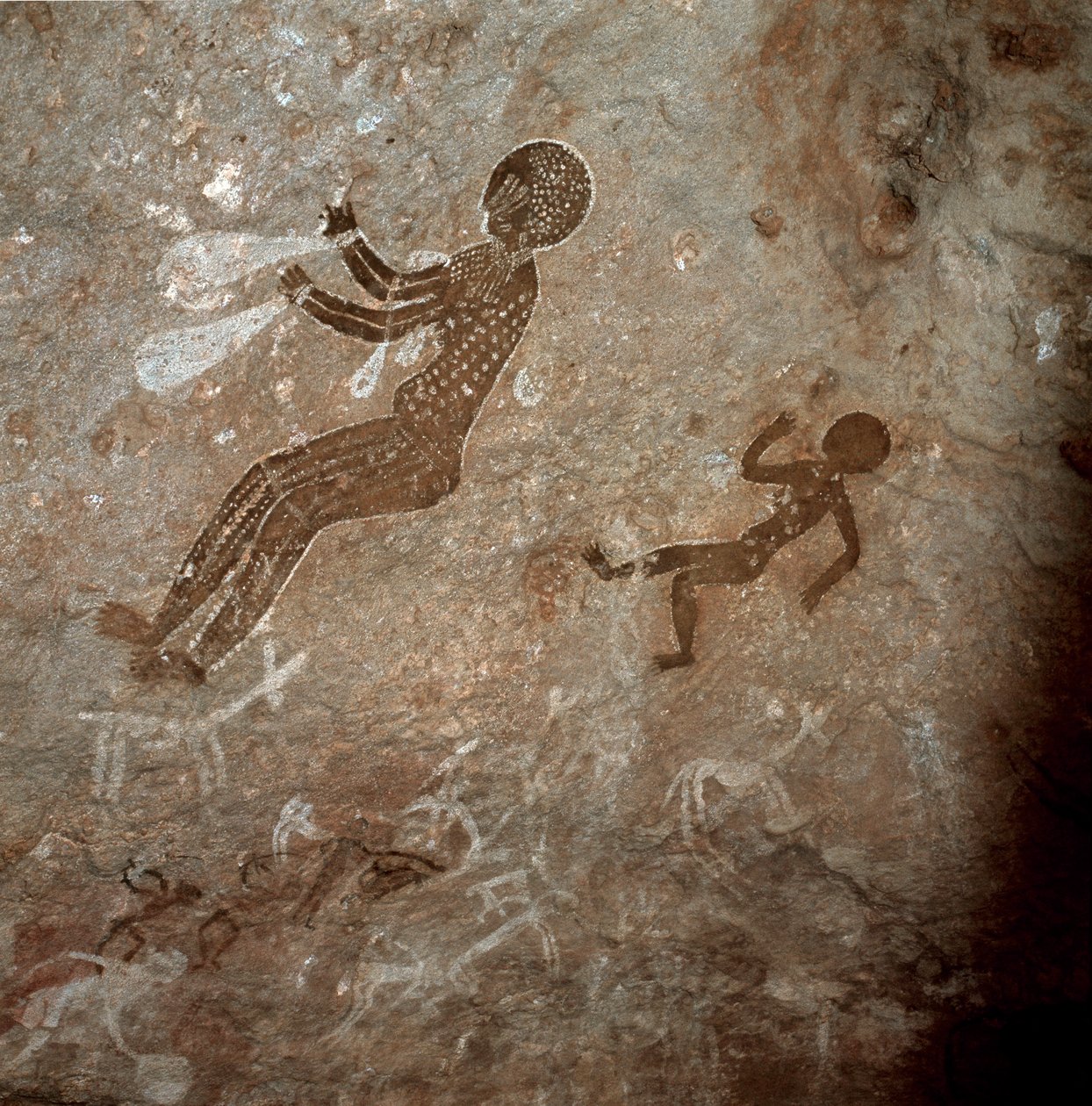 Prehistoric figures top