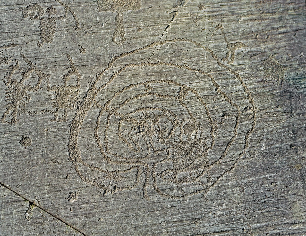 Prehistory, Camunni civilization, rock art: a grave rock of the representation of warriors weapons of shields and swords, and a maze. Period between the Neolithic and the Bronze Age. Capo di Ponte, Parco nazionale delle incisioni rupestri di Naquane, Valca by Prehistoric Prehistoric