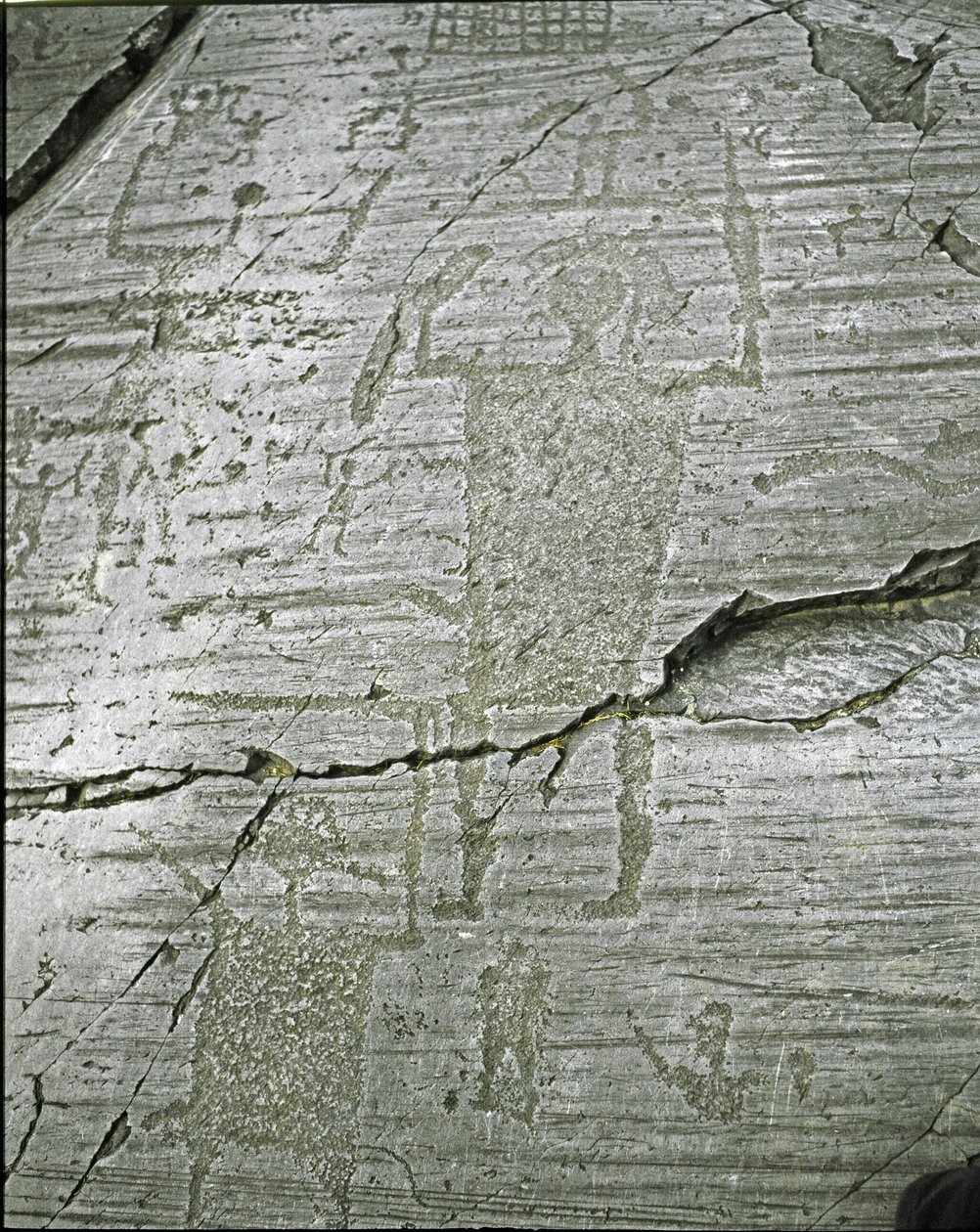 Prehistory, Camunni civilization, rock art: grave rock of stylized representations of warriors, (detail) depicting the Great Warrior armed with a sword and a shield. Period between the Neolithic and the Bronze Age. Roche n. 50. Naquane (Brescia) by Prehistoric Prehistoric