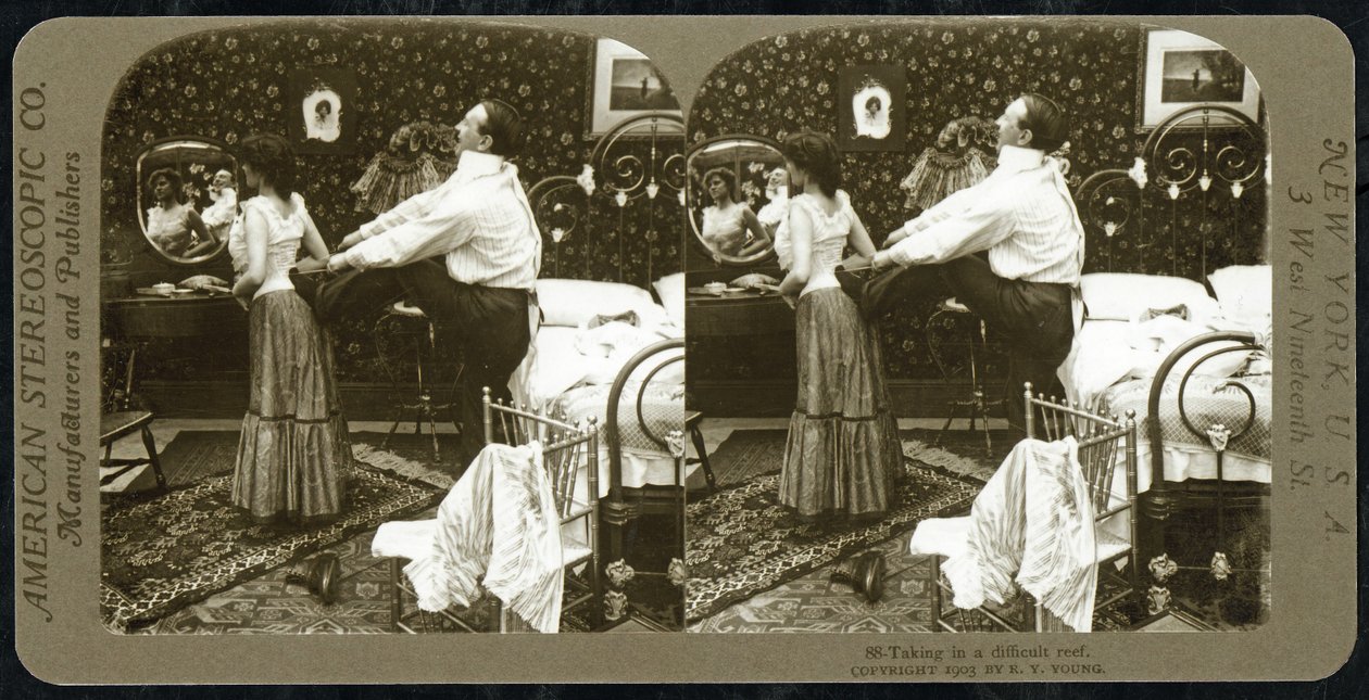 Stereoscopic card depicting a woman being laced into a corset by R.Y Young