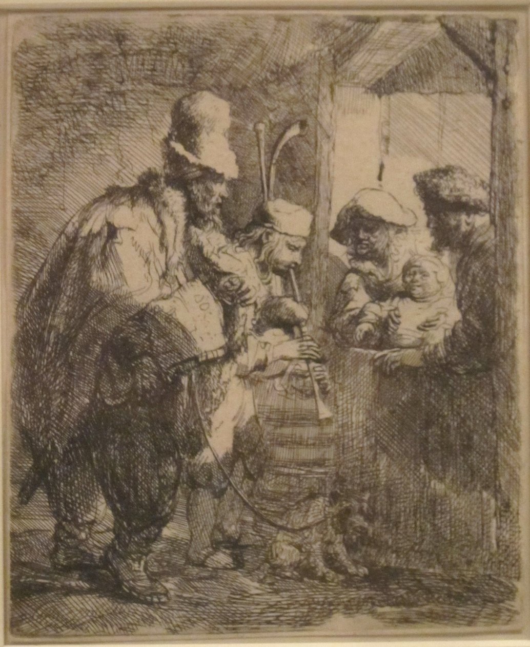 The Strolling Musicians by Rembrandt