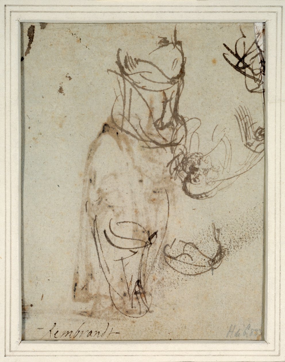 Studies of a tall headdress; and of a head reversed from the recto by Rembrandt Harmensz. van Rijn