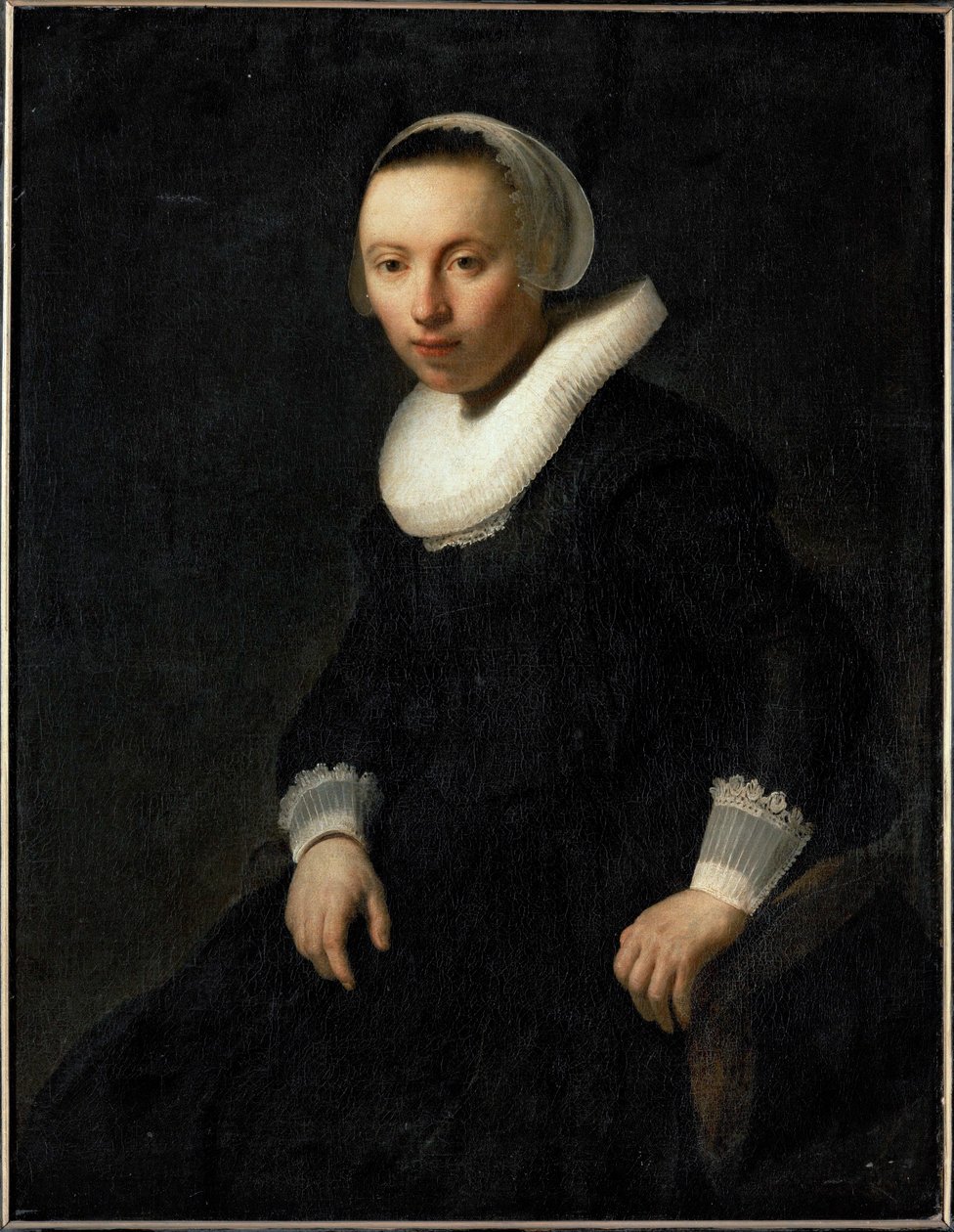 Young Woman Sitting in a Chair by Rembrandt Harmensz. van Rijn