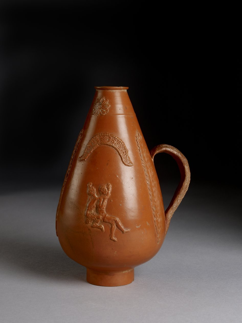 Piriform jug with applied decoration of leopard or cheetah attacking a convict, drunken Pan raping a maenad by Roman