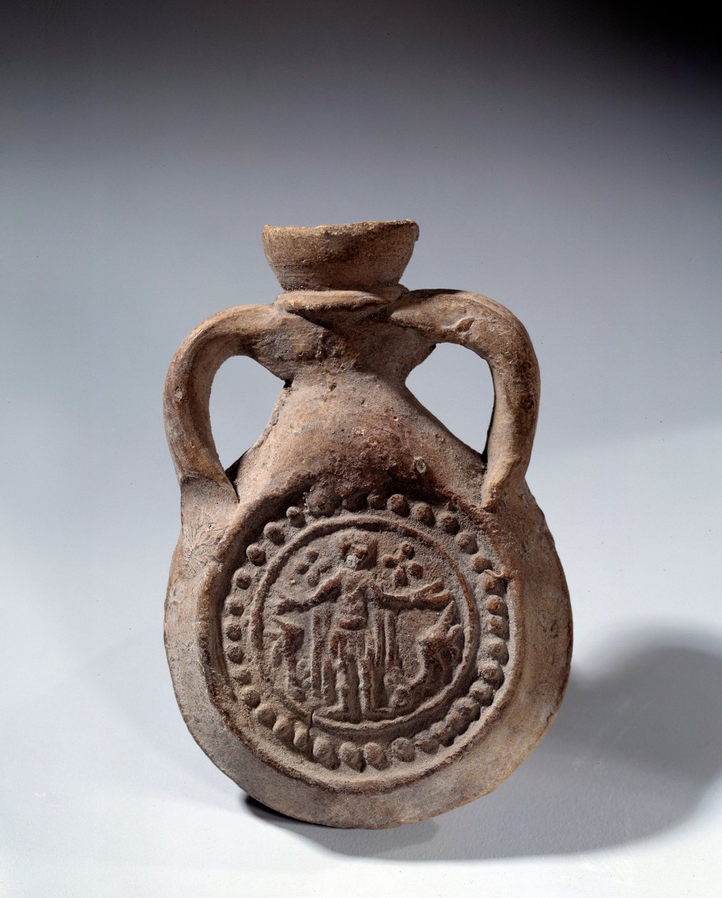 Roman Art: Terracotta eulogy bulb with foot representing a saint. 4th century AD. Paris, Louvre Museum by Roman