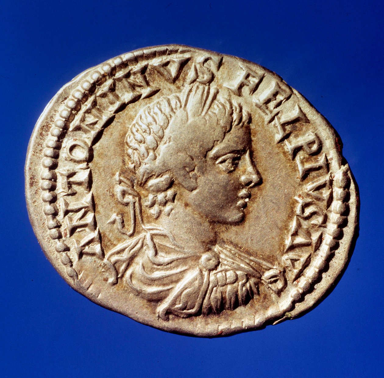 Roman Art: Silver Denier with the Effigy of the Roman Emperor Elagabal by Roman